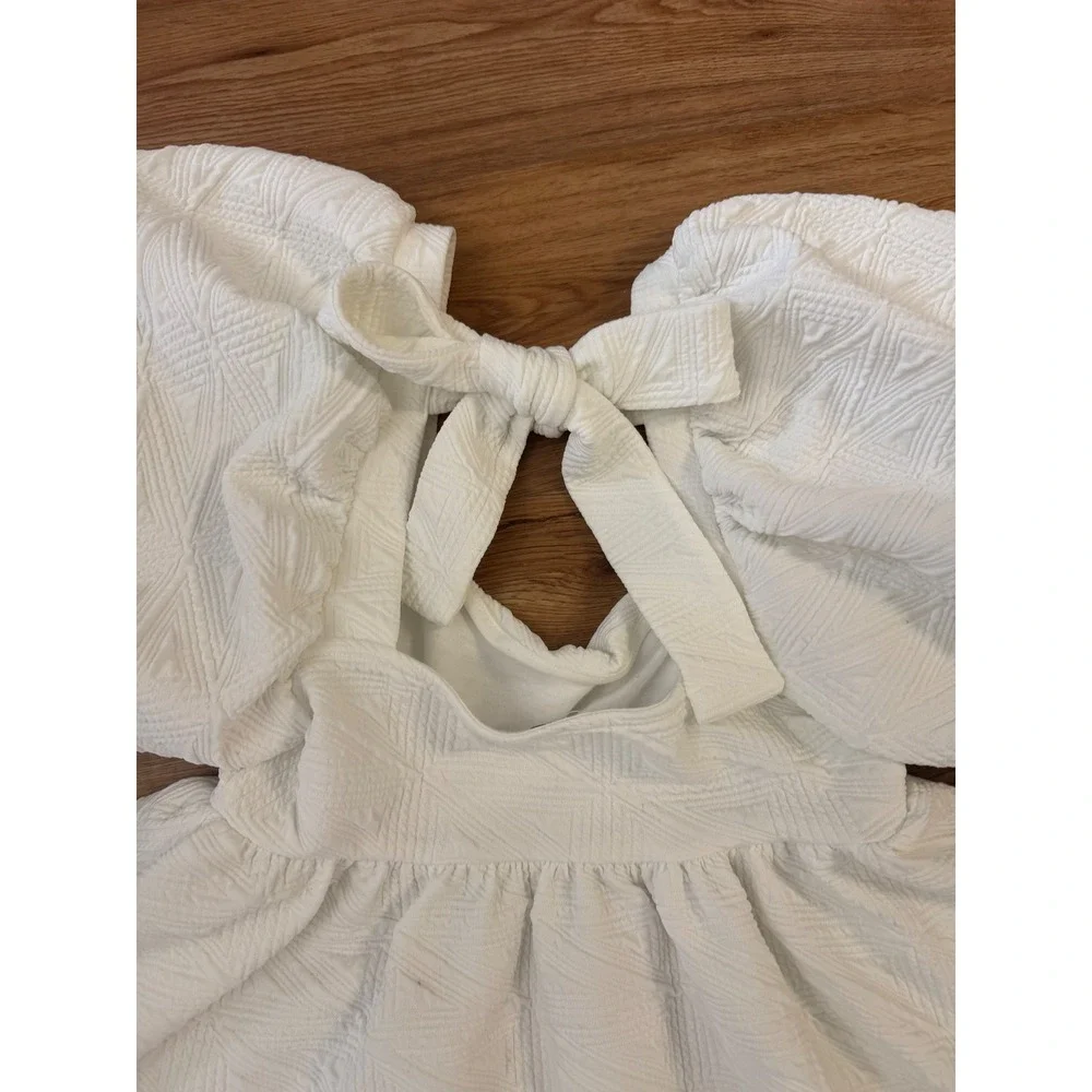 Free People Violet Mini Dress White Puff Sleeve Tie Back Textured Babydoll XS